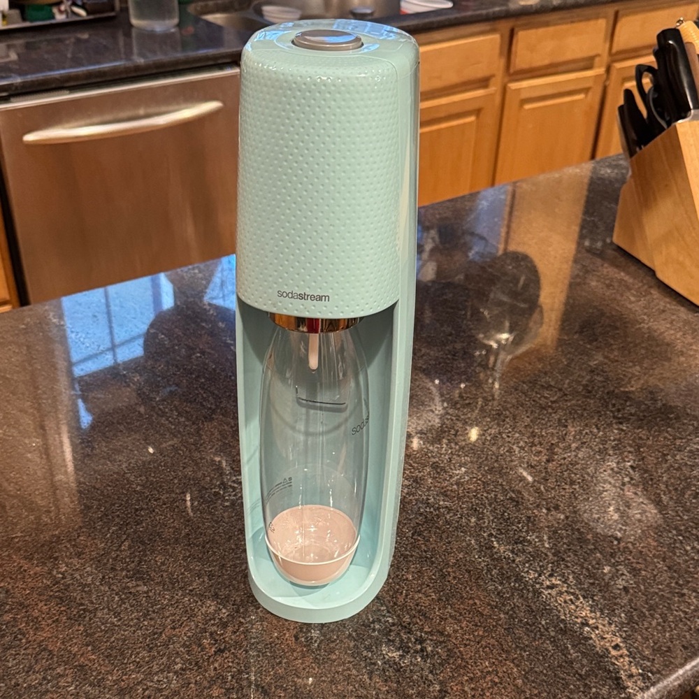 SodaStream Sparkling Water Maker in Sleek Light Teal. Like New. Includes Bottle.